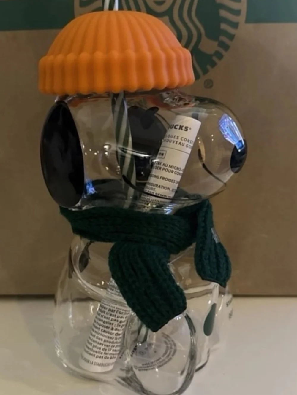 Starbucks Clear Glass Peanuts Snowman Cup with Orange Lid and Green Scarf